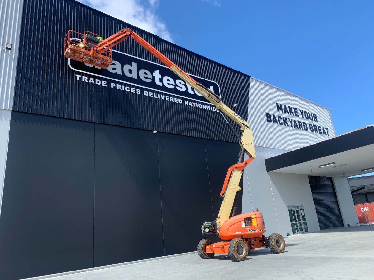 Large commercial building signage installation